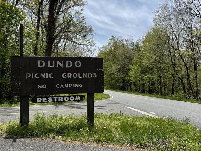 A photo of facility entrance to Dundo Group Campground with No Amenities Shown