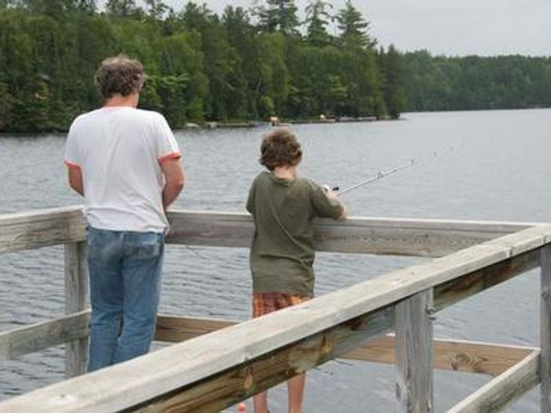 Fenske Lake fishing pier, with people fishing.
