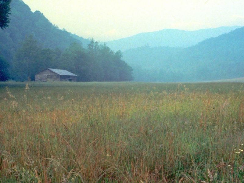 Dawn breaks over an historic cabin in Cataloochee Valley
