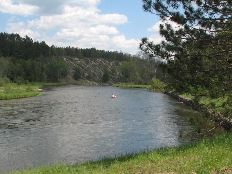 A view of the Au Sable River and Highbanks Overlook from the Gabions Day Use area