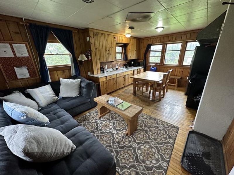 Star Meadow Guard Station kitchen with electric fridge, stove, microwave and coffee maker. Fully stocked with all the necessities including pots and pans, dishes, cups and silverware. 