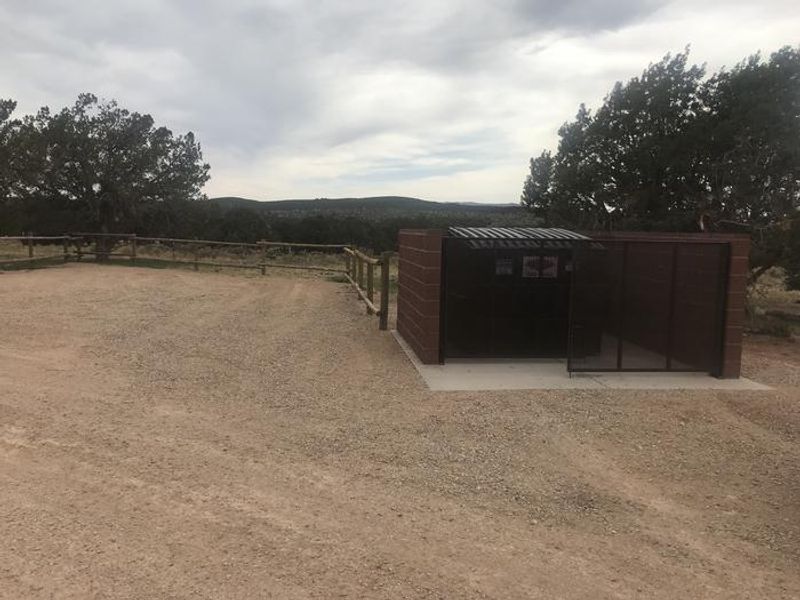 Long vehicle parking and dumpster