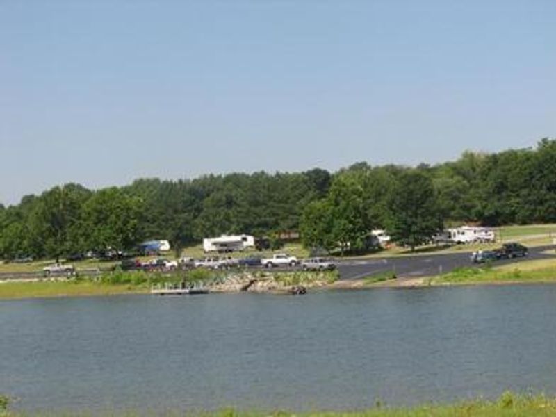 The west side of Rocky Point offers a large boat ramp parking area, two boat ramps, courtesy dock and several long campsites.