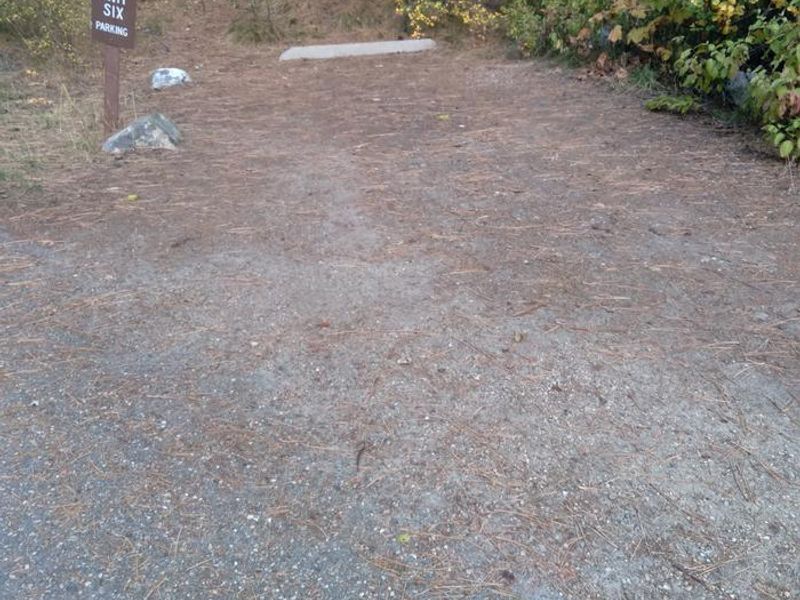 The parking spot for Ten Mile Site 6 is across the path from the campsite itself.
