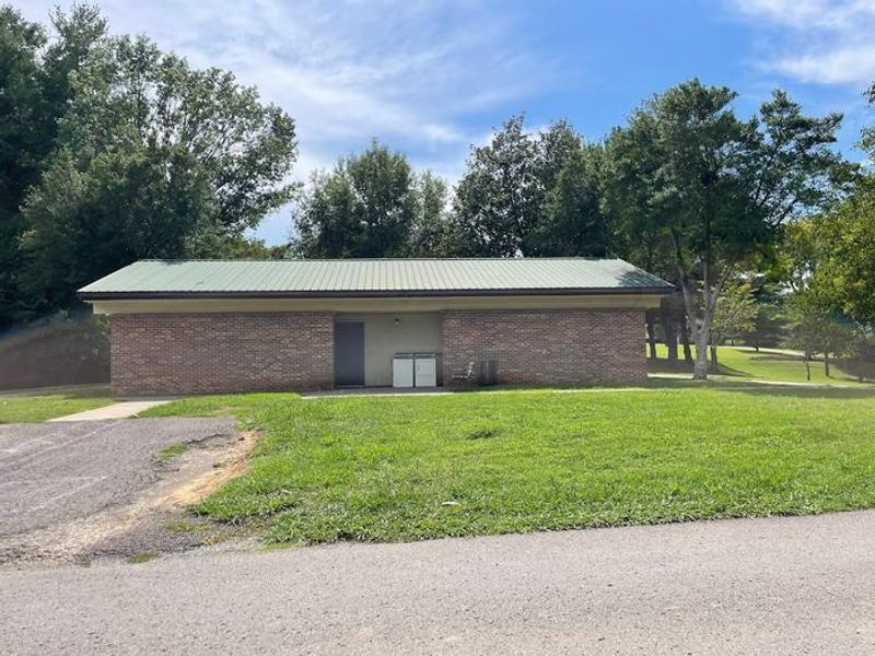Bath house including washer and dryer 