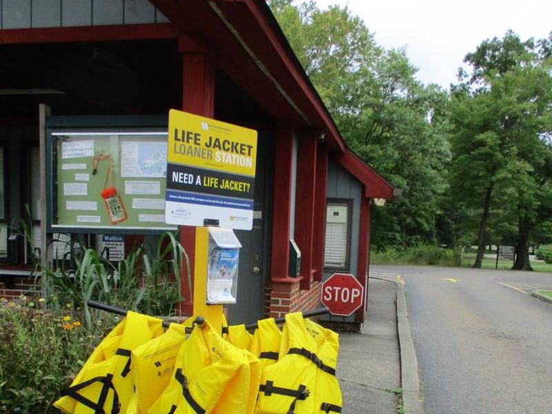 Life Jacket loaner station at campground entrance booth.