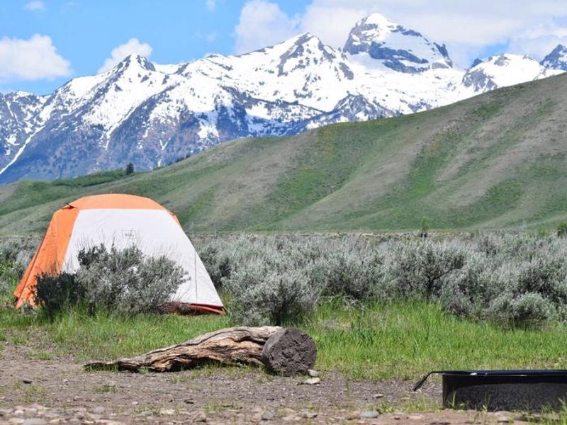 The Gros Ventre Campground is situated in a tranquil setting with incredible views of Blacktail Butte and the Grand Teton Mountain Range. Within walking distance is the Gros Ventre River, which runs through forests, cliffs, and narrow canyons. This area is known for its remarkable fly fishing and photography opportunities. 