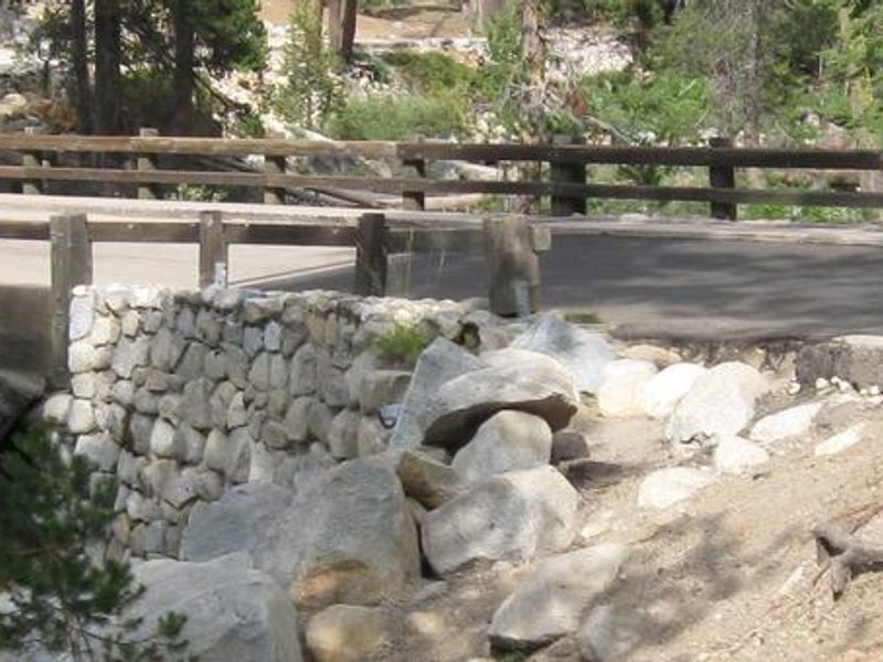 A vehicle bridge crossing a mountain stream in Lodgepole Campground