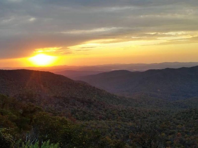 Incredible sunsets can be enjoyed from overlooks across from Mt. Pisgah Campground.