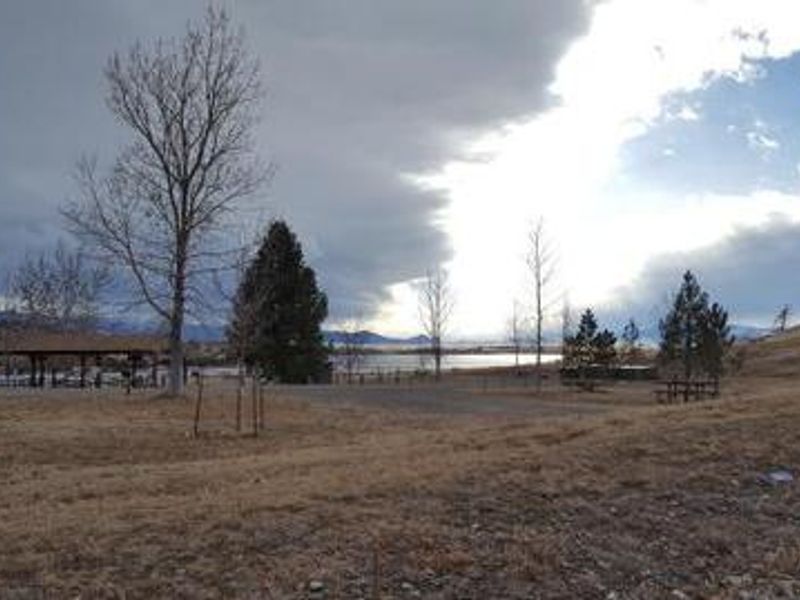 C-Loop ramada overlooking the Elkhorn mountains and Hauser Lake