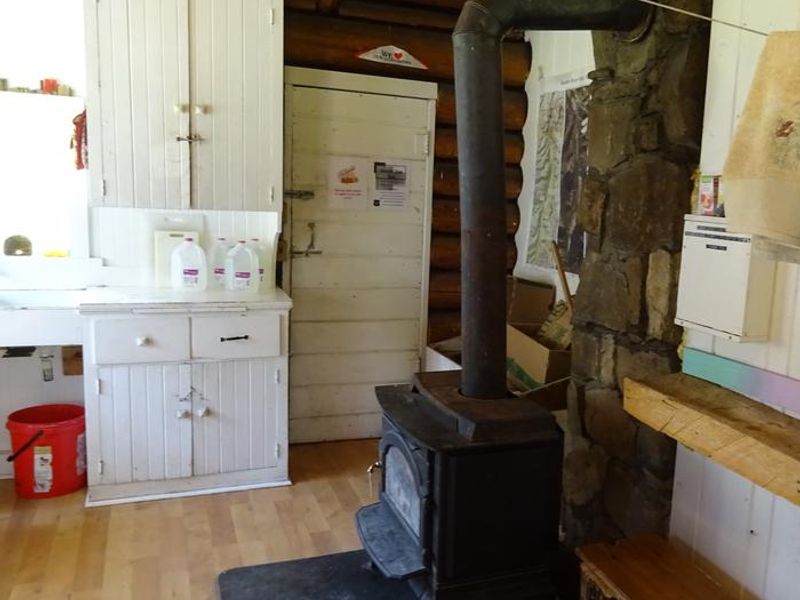 Interior of Fourmile with woodstove