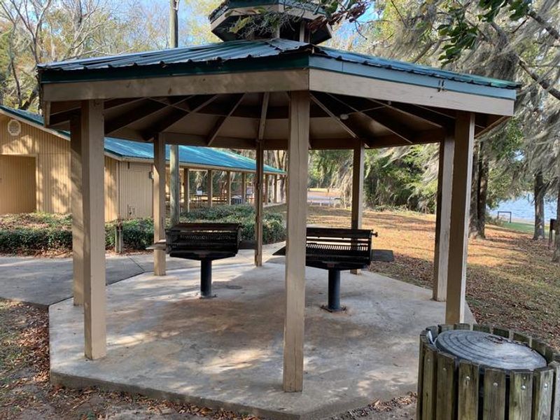 Covered grill area next to this large shelter