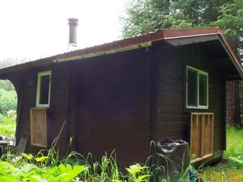 NELLIE MARTIN RIVER CABIN
