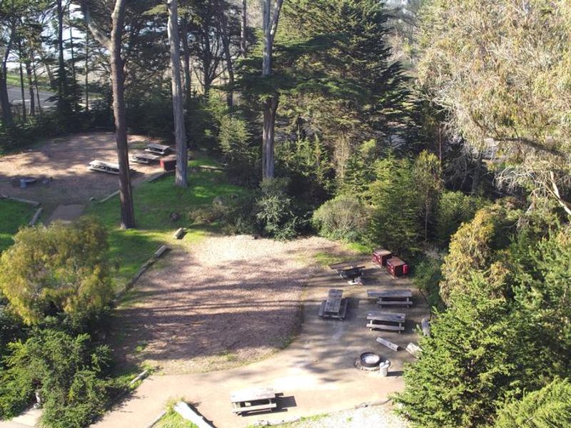 The Yunahia and Huya campsites, as seen from above. Each campsite can accommodate up to 30 people and contains one fire ring, one large charcoal grill, two food storage boxes, and four picnic tables. 