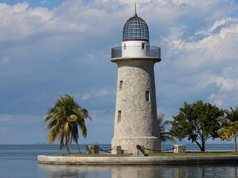 The iconic lighthouse stands watch at the mouth of the Boca Chita harbor
