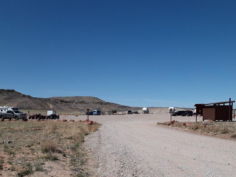 Broad view of the Courthouse Rock Campground with campsites for trailers and horse corrals