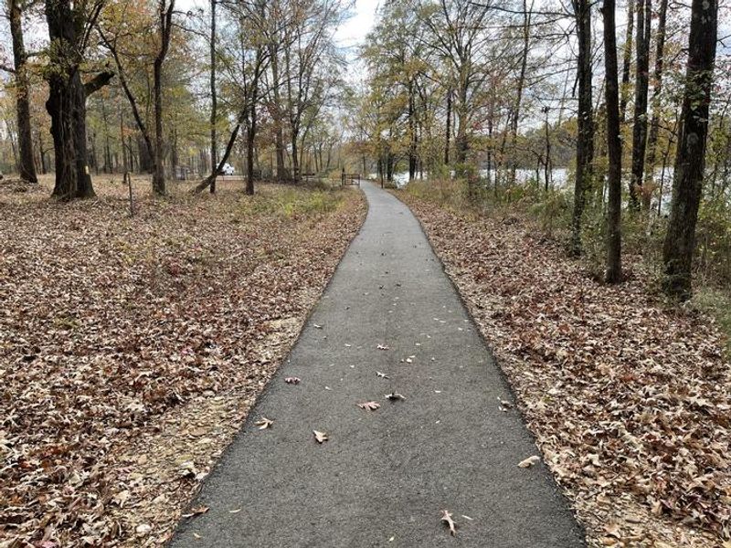 Paved nature trail with access to pier. 