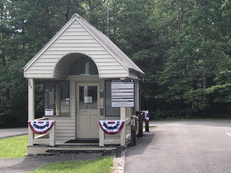 Entrance station of the Bandy Creek Campground with a drive-thru window.
