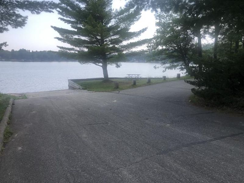 A photo of facility ROUND LAKE with Boat Ramp, Picnic Table