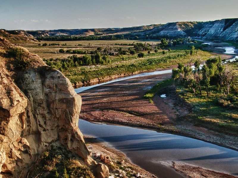 A panoramic view of the Little Missouri River winding through Wind Canyon 