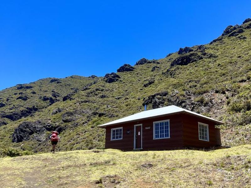 Kapalaoa cabin is reached via a roughly 6 mile hike from Keoneheʻeheʻe or sliding sands trailhead.
