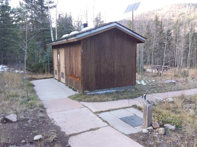 Agua Piedra Campground Restrooms next to a water spout
