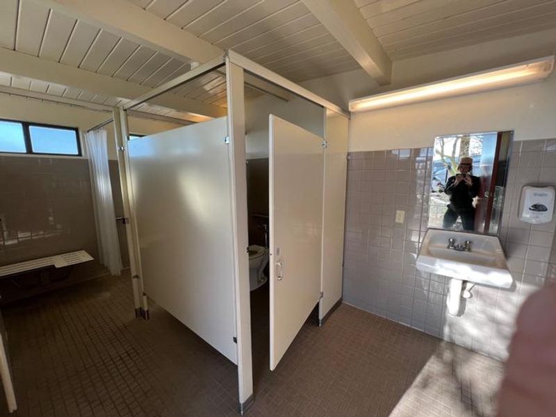 The restrooms are ADA accessible, and restrooms 1, 4, and 5 feature free solar-heated showers.