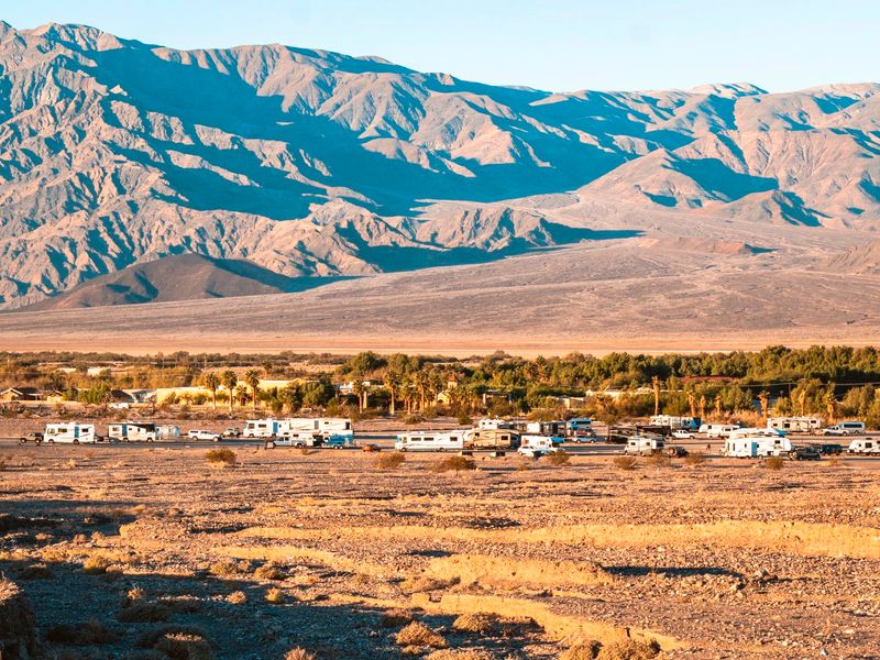 Sunset Campground is in a flat alluvial area with distant views of mountains.