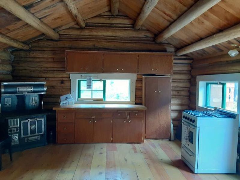 Counter tops, cabinets and a propane stove