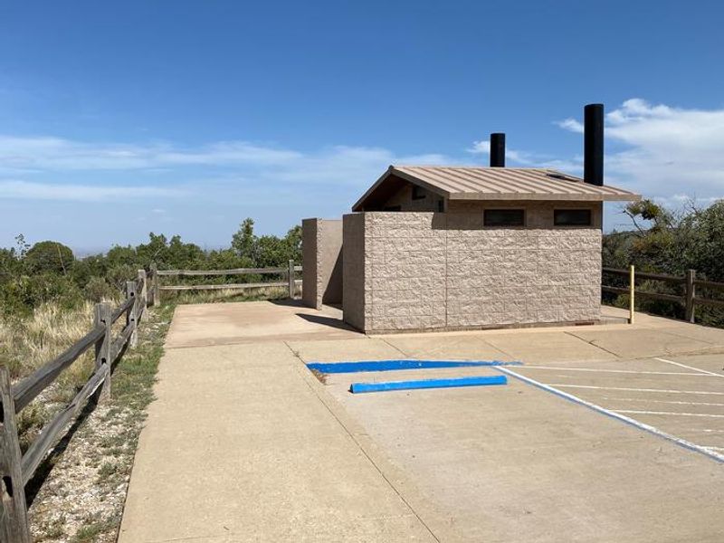 A vault style restroom located in the tent camping loop.  