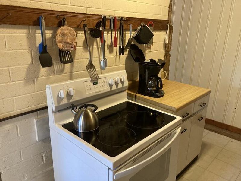 The kitchen is equipped with basic items