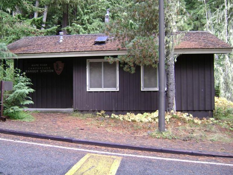The White River Campground Ranger Station, not regularly open to the public, is a small brown wooden structure.
