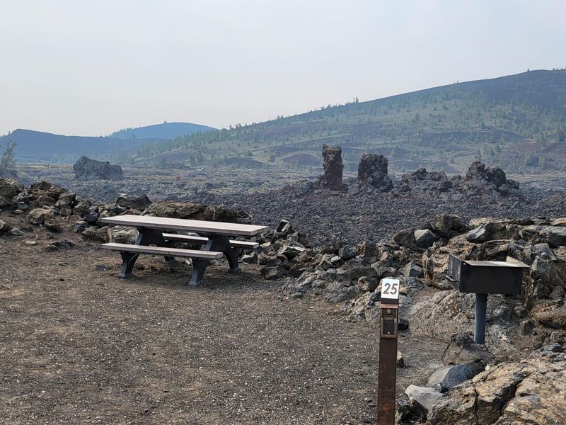 Campsites offer stark views of the unique volcanic landscape.
