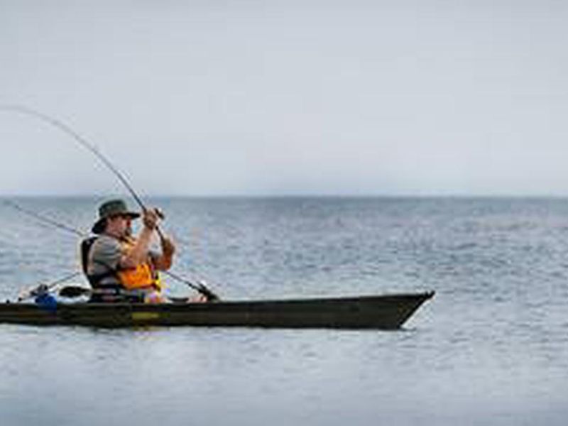 Park Ranger fishing during a program at Indiana Dunes National Park.
