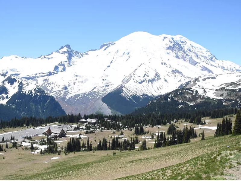 Sunrise, one of the most beautiful places is the park is a short drive from the White River Campground. This view features the subalpine meadows of the Sunrise area in the foreground with snowcapped Mount Rainier in the background.