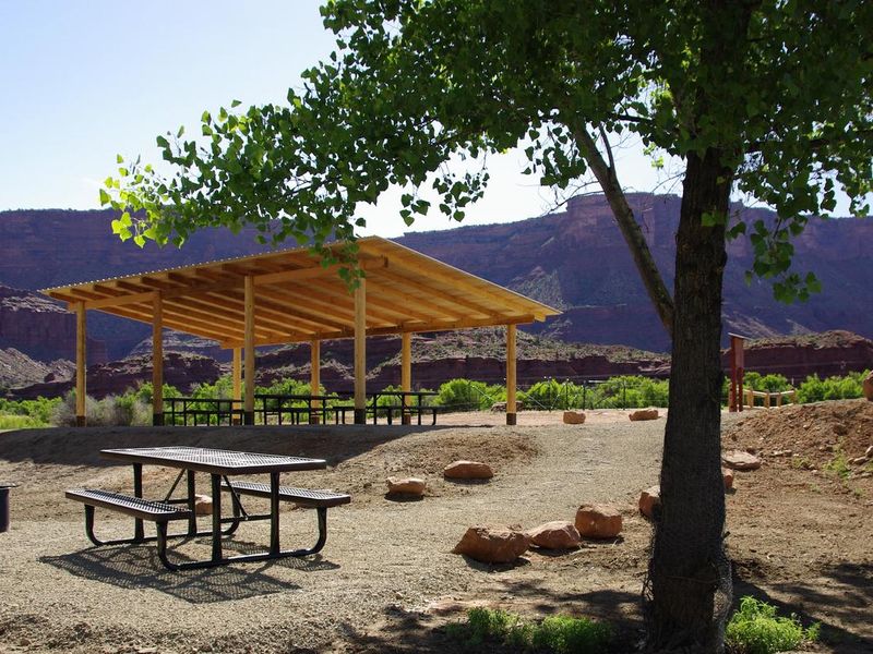 Hittle Bottom Group Site shade shelter, picnic tables, fire ring.