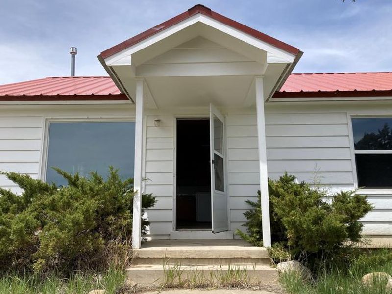 The front porch of Orange Olsen Dwelling.