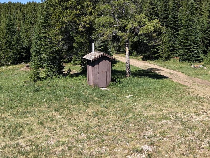 Nearby outhouse for cabin renters.