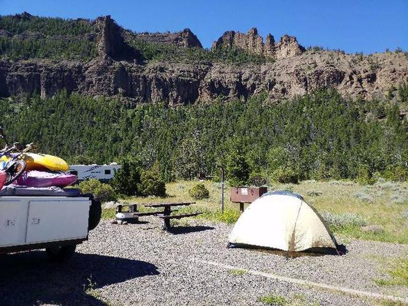 Rex Hale Campground campsite area with cliffs in background