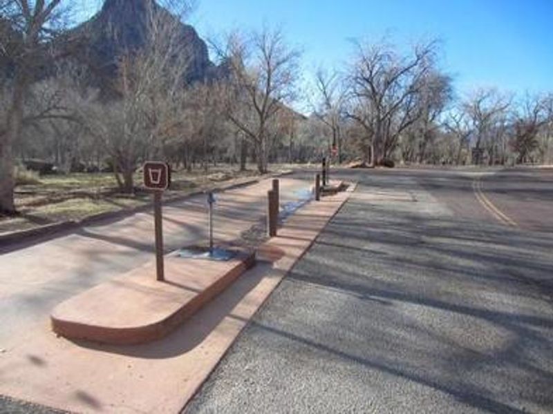 Dump and potable water filling station