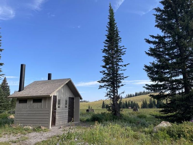 A vault toilet at Deep Lake Campground.