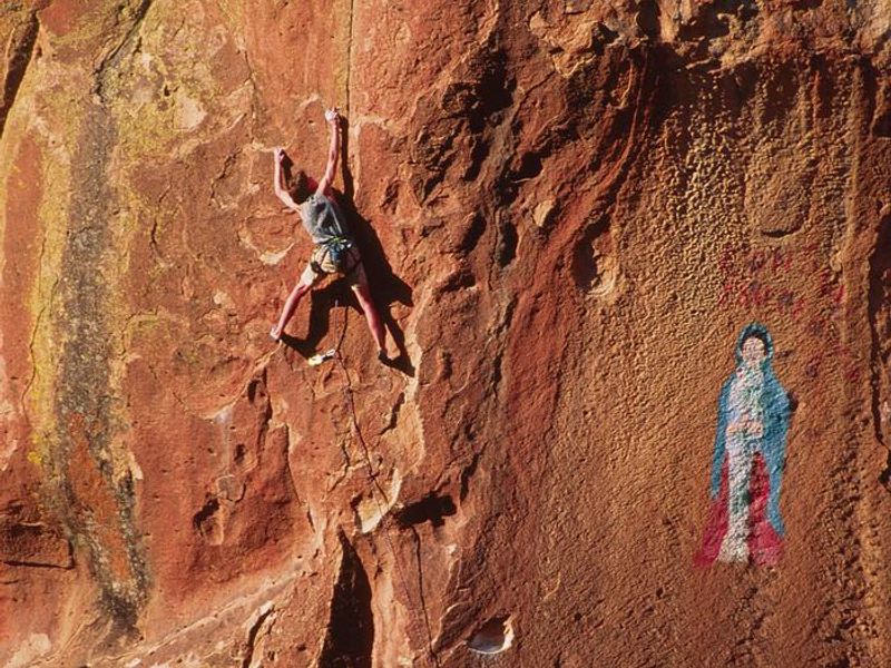 Climber and Pictograph in Penitente Canyon
