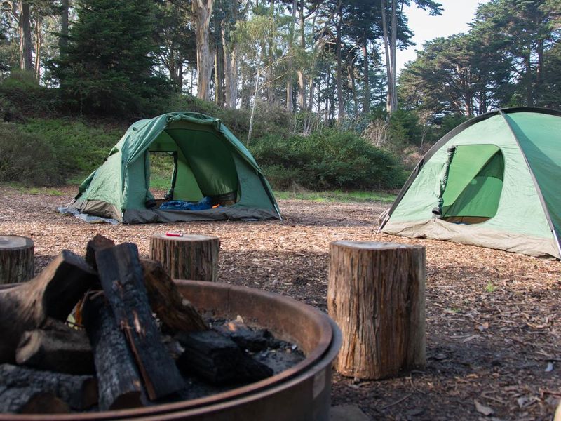 The Colma campsite at Rob Hill Campground. Each campsite comes equipped with a fire ring similar to the one pictured. 
