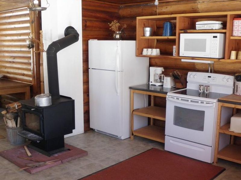 View of kitchen and woodstove in the Lone Cone Cabin
