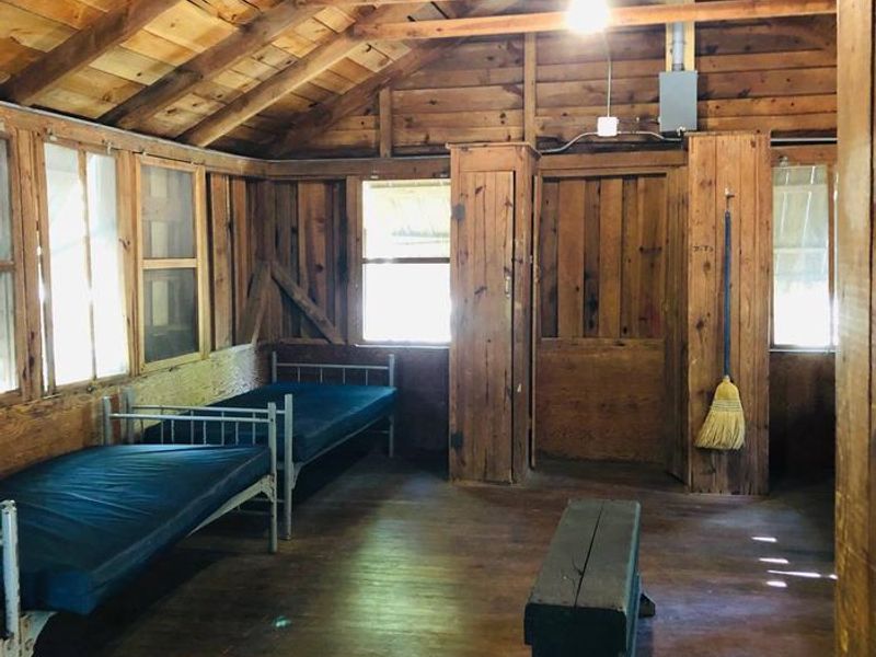 Inside of historic 6 person cabin.
