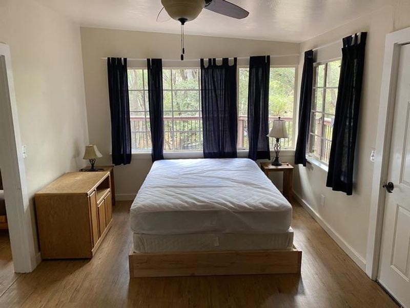 This bedroom in the back has access to the deck.