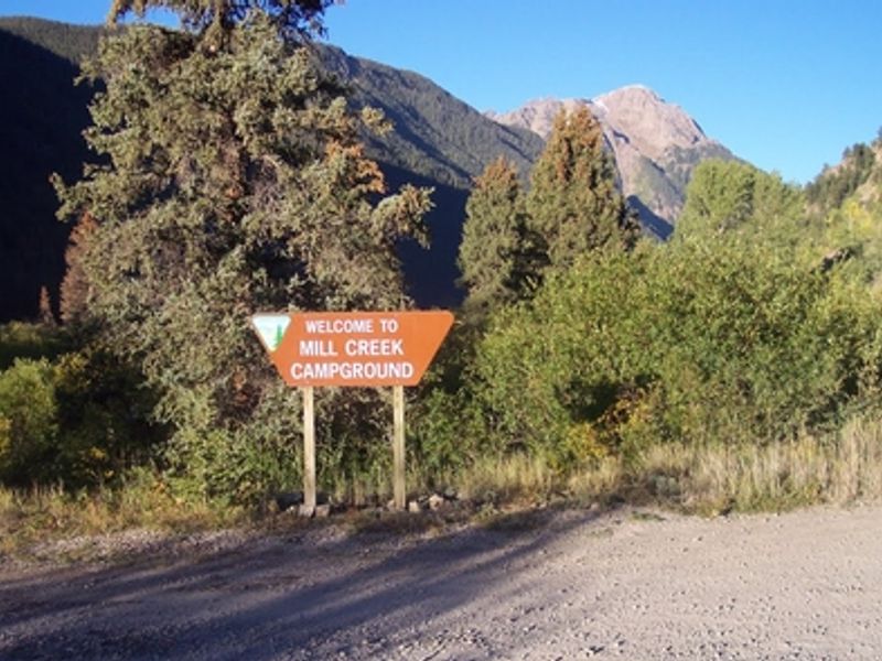 Welcome to Mill Creek Campground sign.