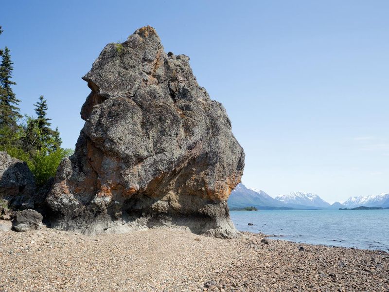 "Hnitsanghi’iy" or "The Rock That Stands Alone" (Priest Rock) on the shoreline near the cabin