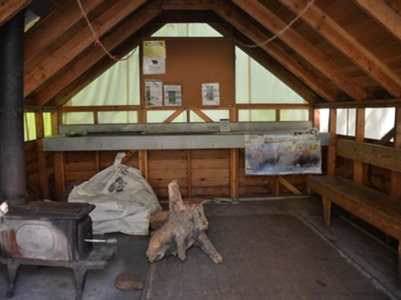 The warming shelter at Finnegan's Point has places to sit, some park information, and a small stove.
