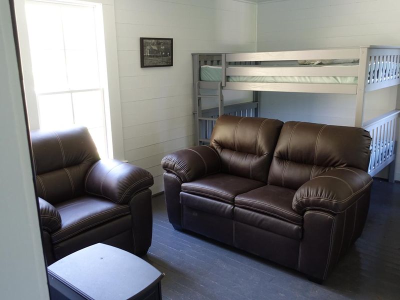 Main living room with double bunkbed. 